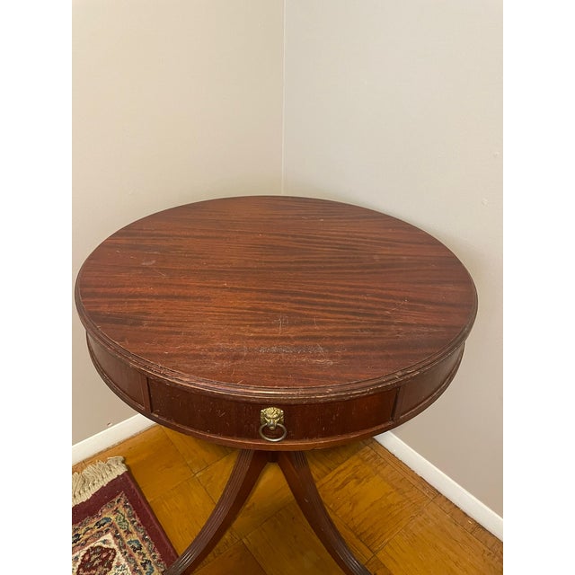 Good table with a single drawer. Used but in good condition.