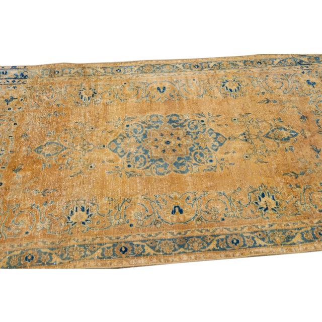 1960s Vintage Persian Distressed Handmade Floral Tan Wool Rug For Sale In New York - Image 6 of 7