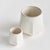 Linear in form, with a brightWhite glaze, this set of pots is pure simplicity. A lovely way to hold your favorite florals,...