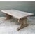 This vintage dining table commands attention with its sturdy plank top and sculptural trestle base. The rectangular top is...