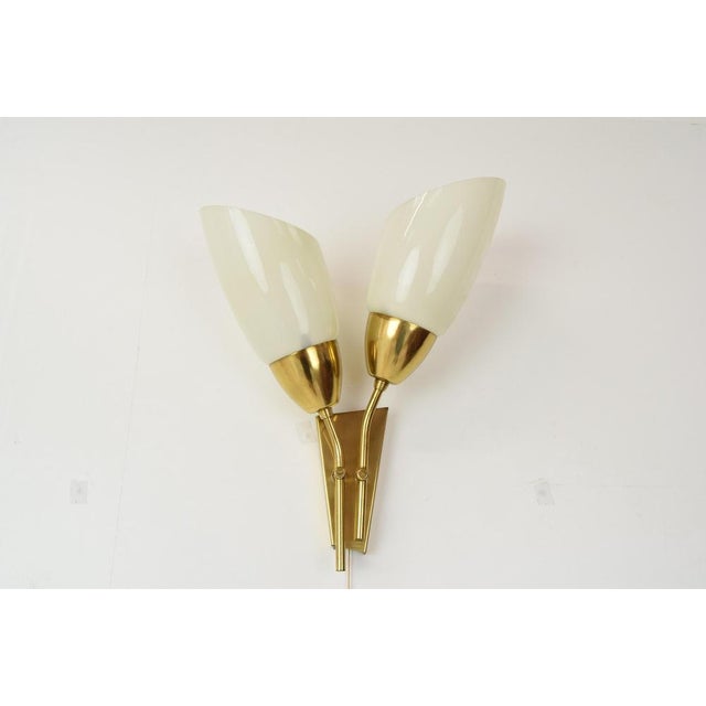 Made in czechoslovakia. Made of glass and brass. With aged patina. Re-polished 2x e14 or e15 bulb. Good original...