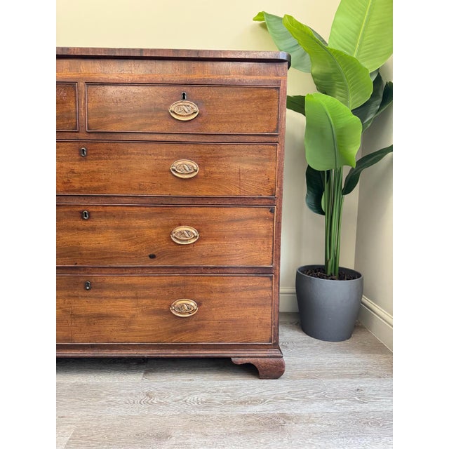 Solid wood extra large Georgian antique chest of drawers. This is beautifully made with hand cut dovetail drawers,...