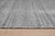 Tessa Xena Silver Handmade Wool Rug, Country of Origin: India. This sophisticated piece presents a minimalist aesthetic,...