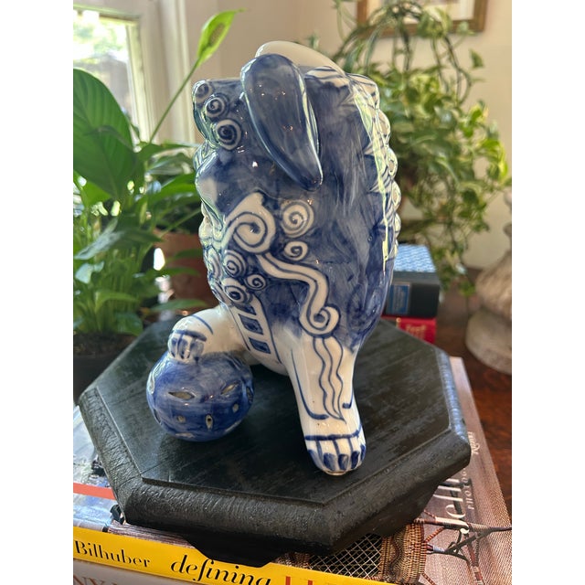Chinoiserie Vintage Chinese Chinoiserie Blue & White Porcelain Foo Dog Guardian Lion on Wood Stand For Sale - Image 3 of 12