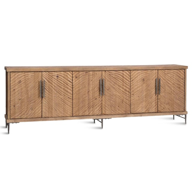 Crafted from salvaged pine and elevated on a hammered iron base, this extra-long six-door credenza makes a subtle yet...