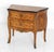 A very well made French Louis XV style 2 drawer chest. The chest exhibits masterful inlay alongside finely worked design...