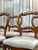 Beautiful rococo revival style, balloon back dining chairs in a set of four. The chairs have been restored with leather...