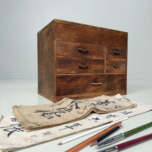 A refined Japanese writer’s cabinet from the 1920s, compact in size yet offering a wide range of practical uses....