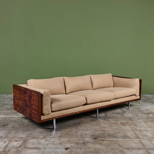 A classic sofa by Milo Baughman, originally designed in 1968 for Thayer Coggin, this sofa seamlessly blends architectural...