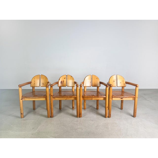 We are offering for sale a beautiful set of four Rainer Daumiller armchairs in the particularly rare "split backrest"...