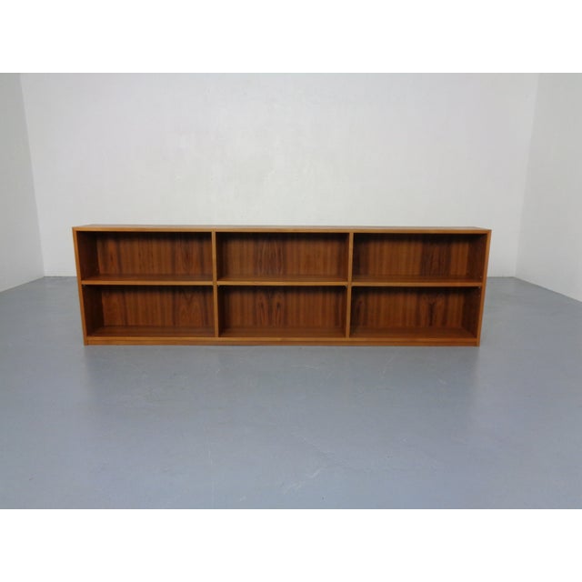 A freestanding Danish teak bookcase from the 1960s. The shelves can be positioned as desired.