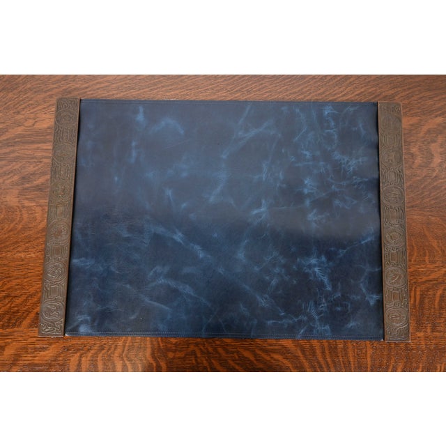 A gorgeous pair of Art Deco or Arts & Crafts period bronze blotter ends featuring symbols of the Zodiac, with a custom...