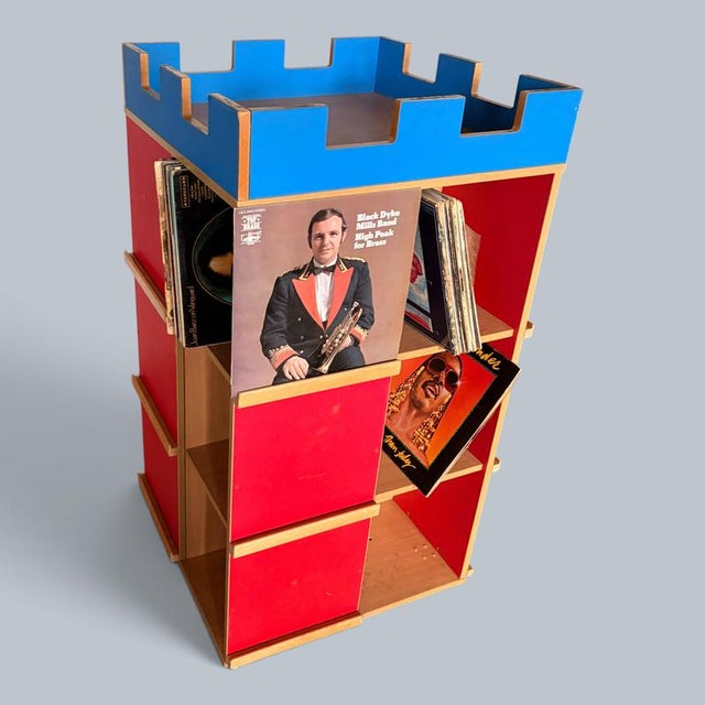 A brilliantly unusual handmade castle-shaped bookcase and vinyl record storage unit , finished in a wonderfully bold...