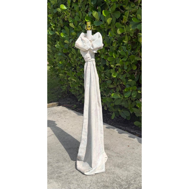 Sculptural vintage postmodern floor lamp in textured plaster, designed in the manner of John Dickinson. The tall column...