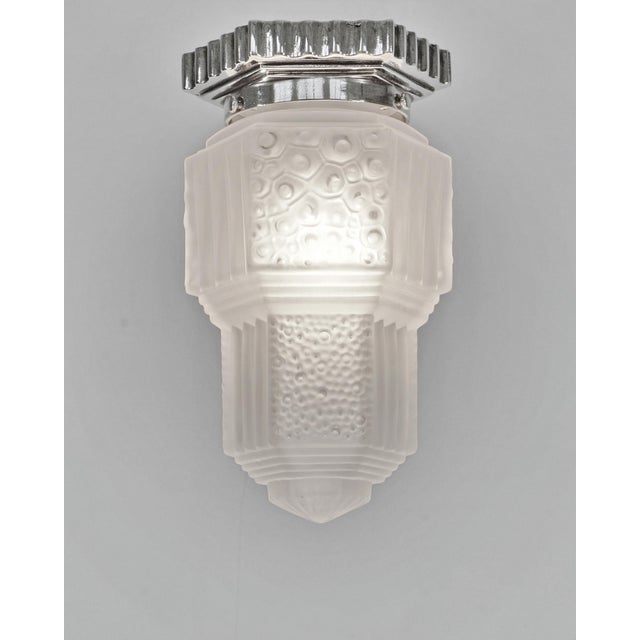 Francis Hubens & Muller frères A small nickel-plated bronze or solid brass French art deco flush mount by Francis Hubens....