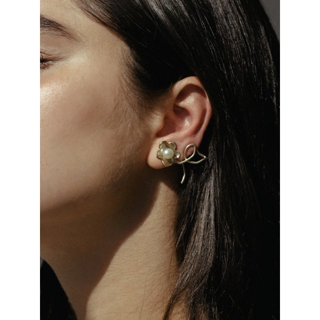 Hand-carved from wax, these daisy-inspired flowers, make a great statement while being super lightweight for everyday wear...