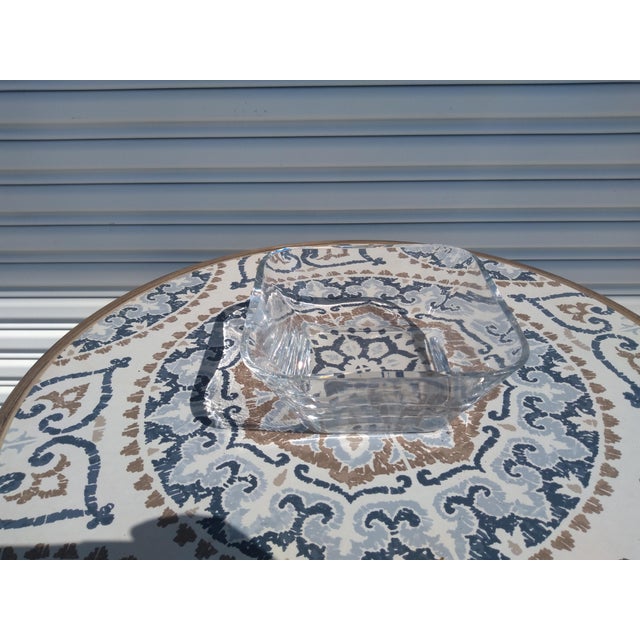 This vase is made out of heavy Crystal. It designed in the shape of a square with rounded corners. It makes for a great...