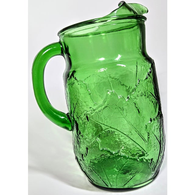 Majolica style pressed glass in a vividly show stopping green. The unusual nearly jelly green is an unreal 80s alumni. I...