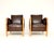 A stylish and very well made pair of Swedish Art Deco armchairs in satin birch and leather. They were recently imported...