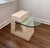 Striking 1980s postmodern side table with a sculpted tessellated Mactan fossil stone base in warm cream and an asymmetric...