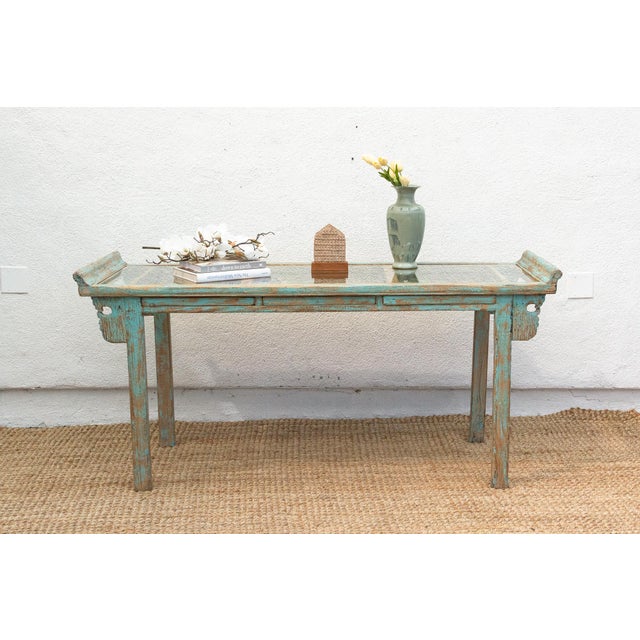 Bring a touch of eclectic charm to your home with this striking reproduction console writing table. Combining elegant...