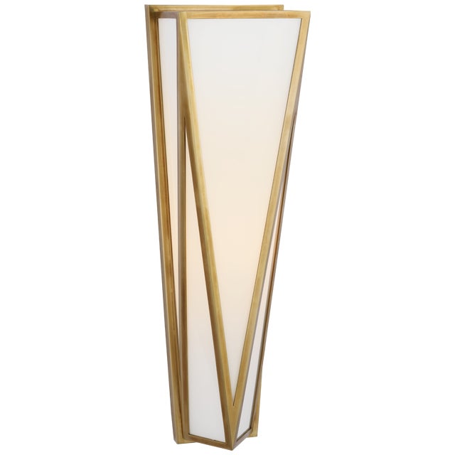 Lorino Medium Sconce in Hand-Rubbed Antique Brass with White Glass Designer: Julie Neill Height: 17.75" Extension: 4.75"...