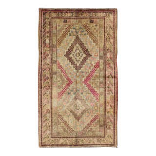 Early 20th Century Antique Khotan Rug With Paired Diamond Medallions in Wine Red For Sale