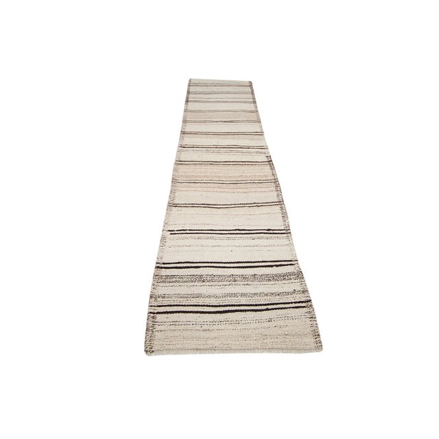 Vintage handwoven decorative kilim runner from Northern Iraq. Approximately 40-50 years old. In very good condition.