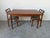 Elegant 1960s Danish Modern extending dining table crafted in richly grained teak by AM Ansager Møbler, Denmark. This...