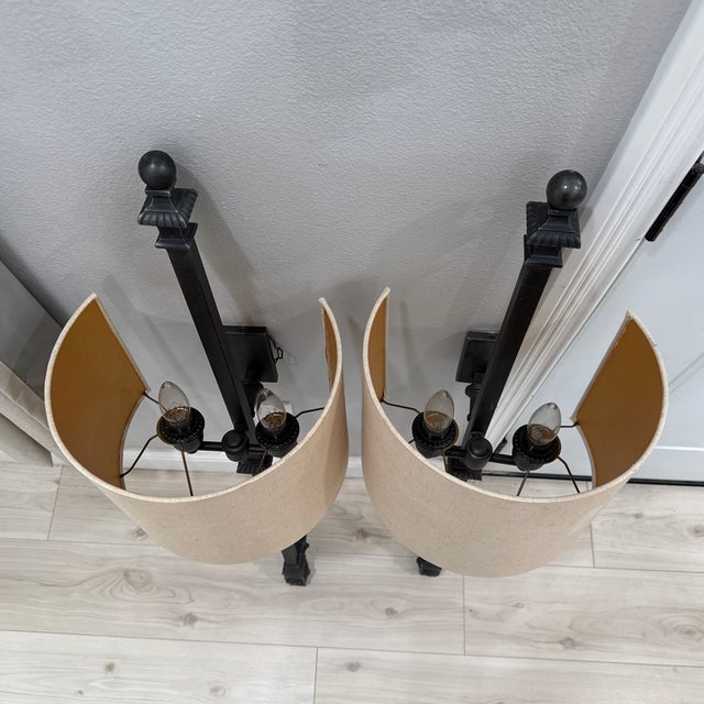 44” by 12” RH wall sconces. Metal frame with linen shades. One shade slightly scratched.