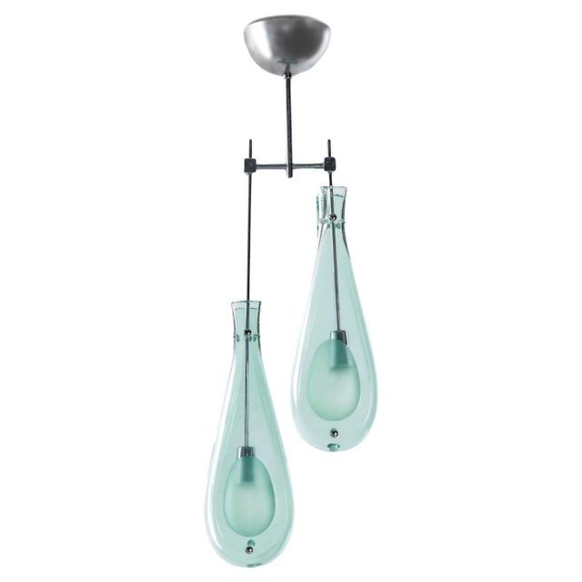 Modern vintage pendant consisting of a nickel-plated brass structure and partially frosted Murano glass. Designed by Max...