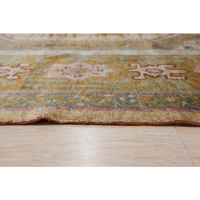 Hand-knotted in luxurious mohair, this 9 x 12 Oushak rug carpet is a distinguished offering from our contemporary room-...
