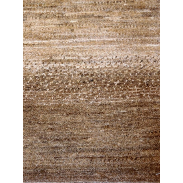 A Zollanvari Persian Loribuff rug. Luxuriate in soft landing with this neutral rug. 4'x 6'.