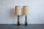 Vintage / Retro accent lighting. Enjoy a pair of continuously curving wood table lamps. The delicate design will impact...