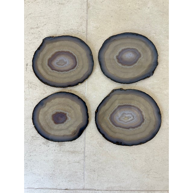 Fantastic set of four vintage 1970’s coasters of natural agate chalcedony stone from Brazil. Rich shades of taupe, grey,...
