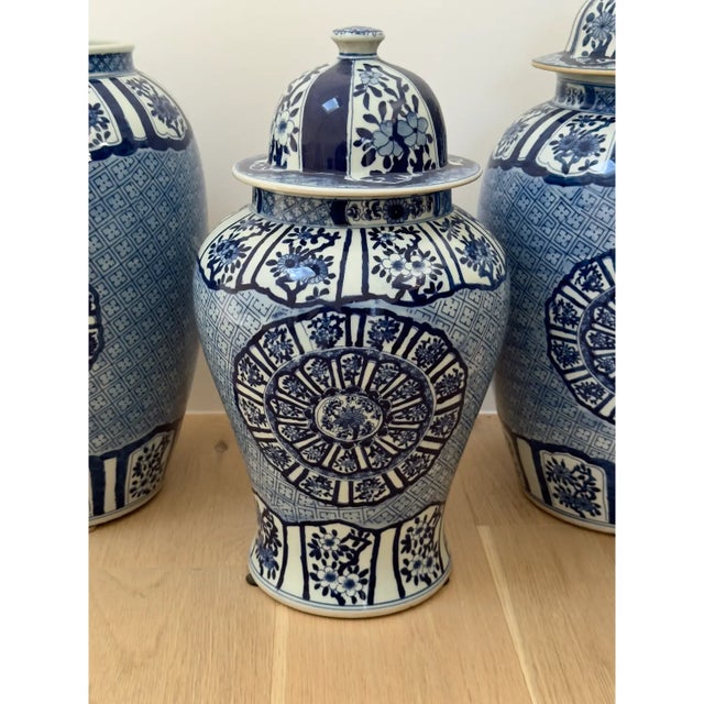 This is a set of 3 large blue & white jars purchased at Barclay Butera, one is missing the lid which is reflected in the...