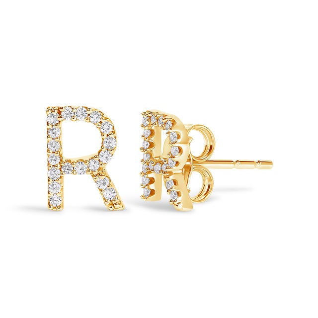 Expertly crafted to symbolize individuality and grace, this exquisite "R" initial stud earring is fashioned from radiant...