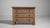 A robust oak chest reflecting the 1970s European focus on solid wood furniture and long-term durability. Unlike lighter...