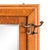 A circa 1910 hall mirror of quarter-sawn oak having four copper-plated brackets mounted to the face; each with four hooks...