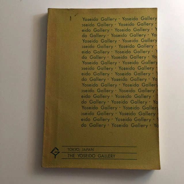 Softcover Catalog of the Tokyo print world 219 images in color and b +w Mild aged odor to glossy pages Glued pages mildly...