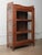This handsome wooden glass-front cabinet showcases the warmth and authenticity of 20th-century Indian craftsmanship. Built...
