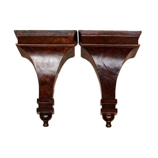 A handsome pair of vintage Gothic Revival wall corbels crafted in richly toned possibly mahogany (or mango wood with...