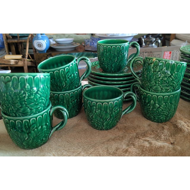 A stunning complete service for 8 in vivid emerald green majolica-style ceramic by The Haldon Group, made in Japan. All-...