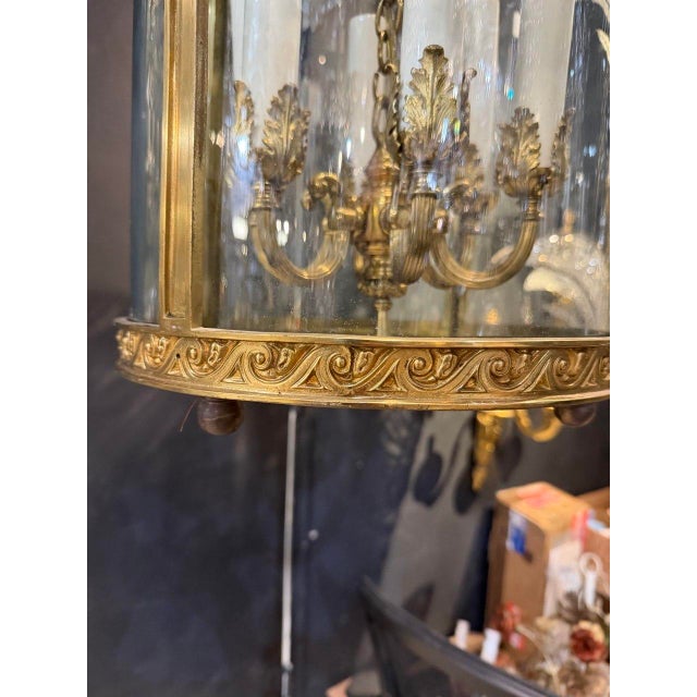 A nice gilt bronze neoclassic design Caldwell lantern with interior lights (12 available from nice central park south...