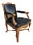 A vintage Louis XV style armchair by the acclaimed Danby Company. This walnut and black leather chair features a...