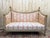A louis xvi period salon suite comprising a sofa and a pair of bergère armchairs in gray-green lacquered wood (with...