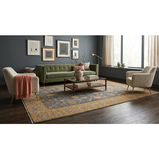 This stunning modern rug reimagines the ancient Khotan aesthetic through a sophisticated, contemporary lens. Handcrafted...