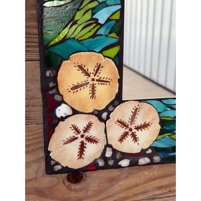 Bring a little piece of the coast home with this fabulous vintage handmade mosaic wall mirror. Richly detailed with a...