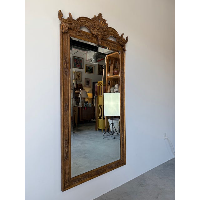 Beautiful vintage LaBarge wall mirror crafted in Italy, featuring an intricately carved wood frame with elegant Rococo-...