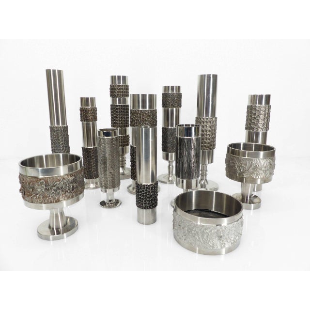 A cohesive set of 13 decorative steel vases and containers, produced by bmf (bayerische metallwarenfabrik) in germany...